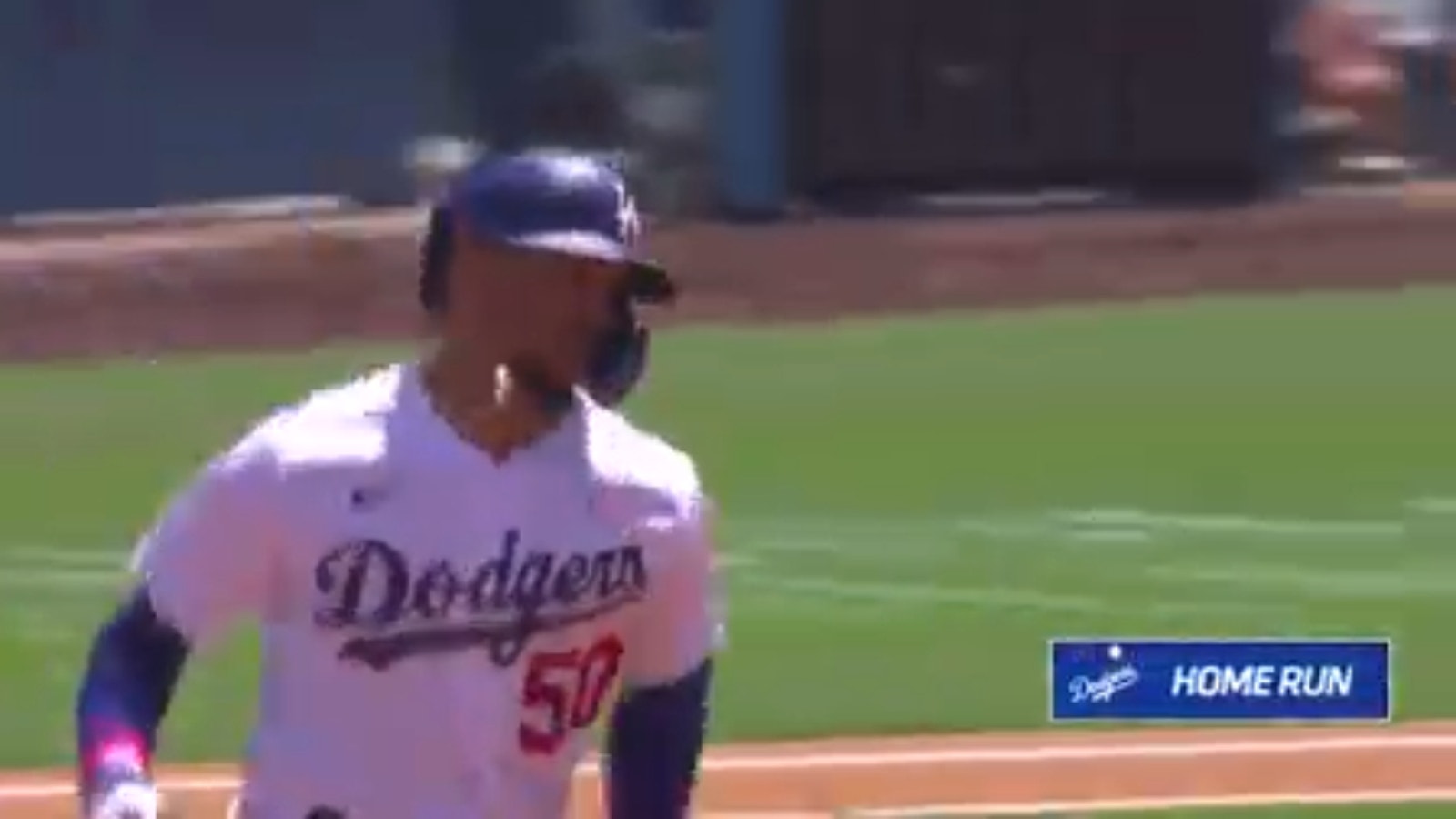 Mookie Betts hits a two-run homer, giving the Dodgers the lead against the Padres
