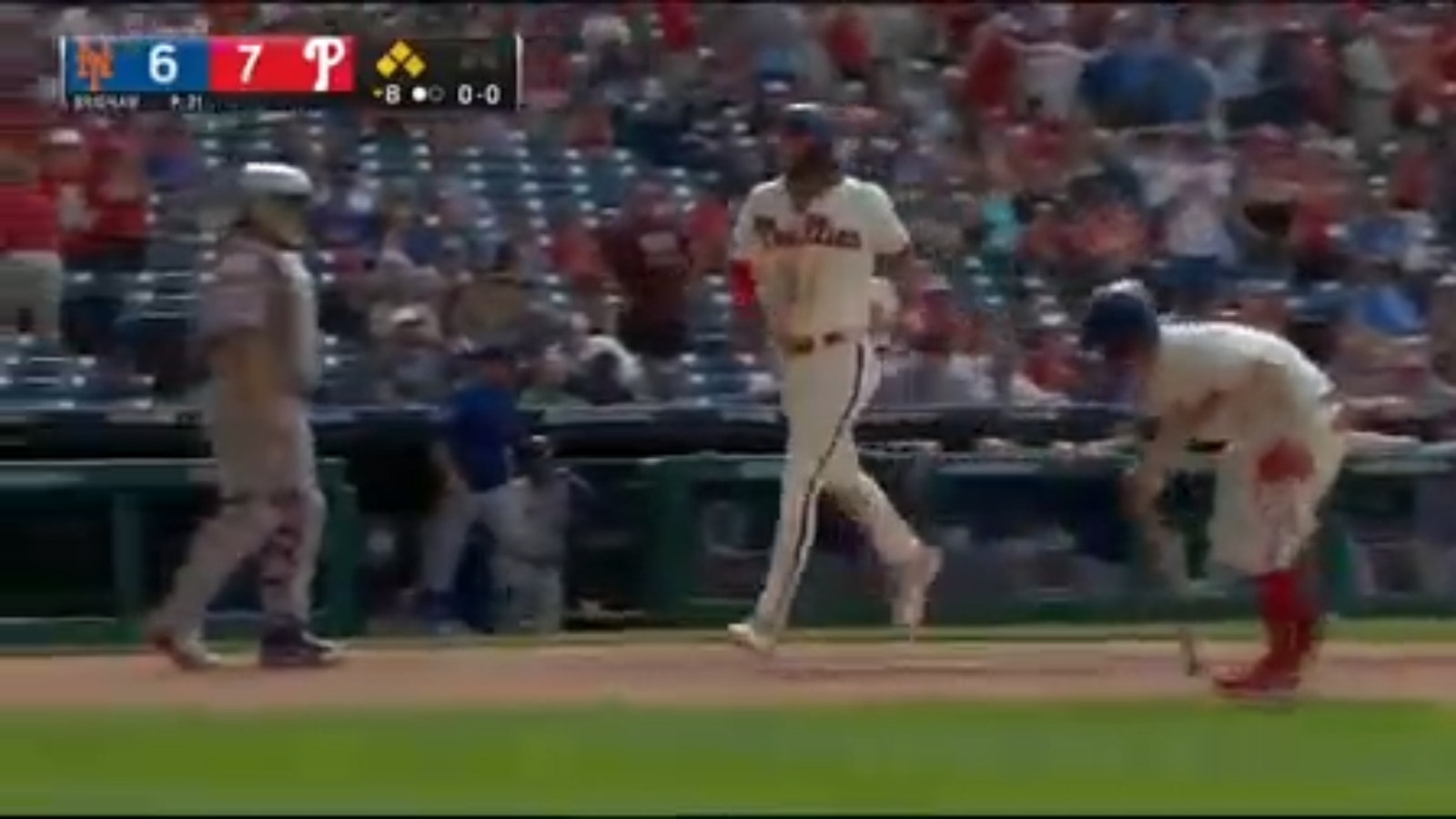 Phillies score four in the eighth and come back to beat the Mets after Trea Turner is hit with the bases loaded