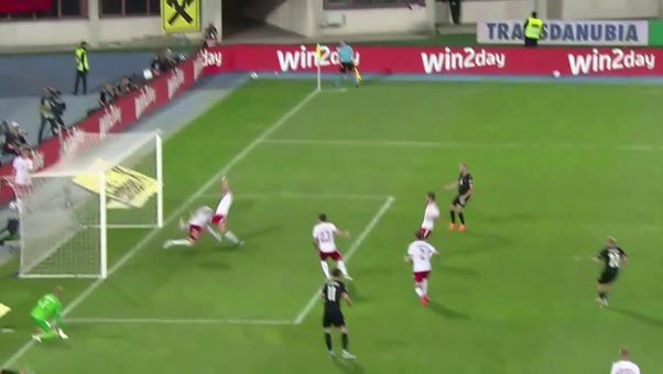 Xaver Schlager ties the game for Austria after Denmark's turnover