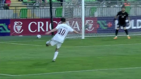 Latvia takes a 4-2 lead after Janis Ikaunieks' strike goes to the back of the net 