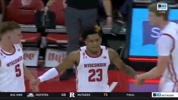 Wisconsin's Chucky Hepburn drills a buzzer-beater at the half against South Dakota