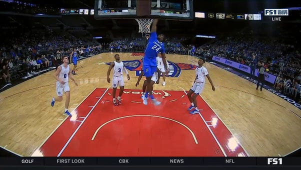 Creighton's Arthur Kaluma throws down the one-handed dunk