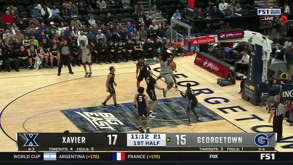 Georgetown's Bradley Ezewiro throws down the two-handed slam dunk