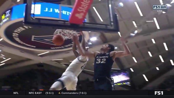 Cam Whitmore throws down the baseline jam to help Villanova close the lead
