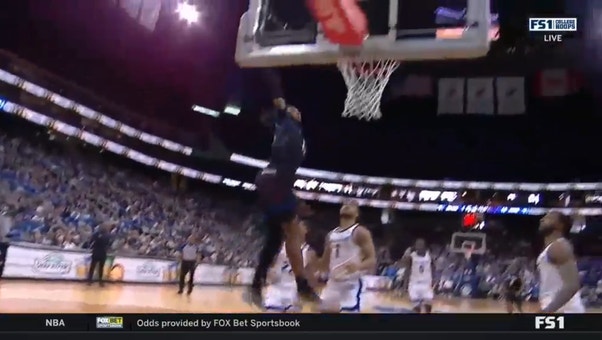 Da'Sean Nelson hammers in a nasty jam extending Depaul's lead against Seton Hall