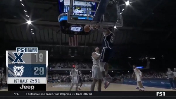 Butler's Manny Bates slams down a huge dunk for the Bulldogs, Xavier trails