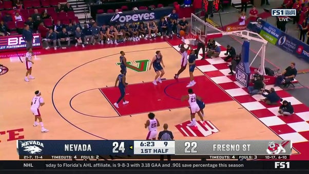 Fresno State's Eduardo Andre SLAMS a dunk down against Nevada to bring the game to a tie