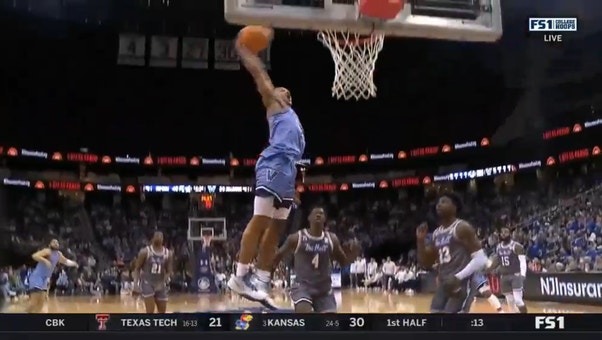 Villanova's Mark Armstrong throws down the hammer with an incredible dunk over Seton Hall