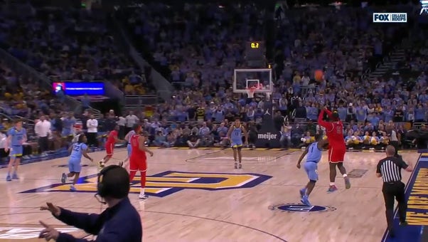 St. John's Dylan Addae-Wusu sinks a JAW-DROPPING buzzer-beater from beyond half-court to end the first half