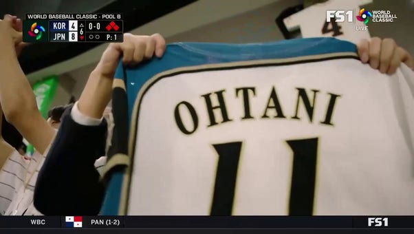 Shohei Ohtani ropes an RBI single to extend Japan's lead over Korea