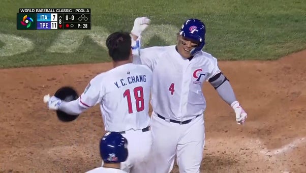 Kungkuan Giljegiljaw hits a three-run home run to give Chinese Taipei an 11-7 lead over Italy