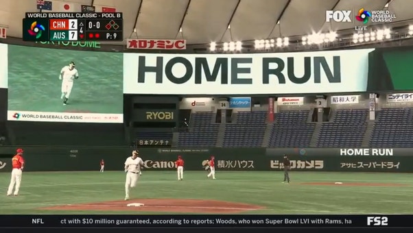 Australia's Robbie Glendinning crushes a 2-run jack to centerfield for a 7-2 lead over China