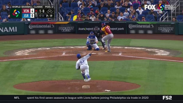 Eugenio Suarez hits a solo home run to extend Venezuela's lead 5-0 over Israel