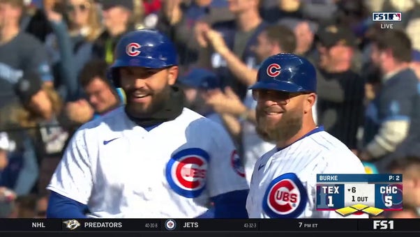 Cubs' Eric Hosmer smacks a two-run single to grab a 5-1 lead against the Rangers