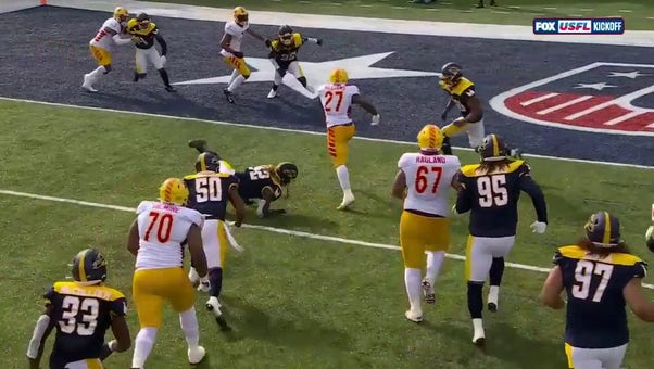 Case Cookus hands off to Dexter Williams for a 12-yard touchdown to give the Stars a 20-7 lead over the Showboats