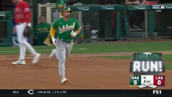 Kevin Smith sends a three-run homer to left field as the A's take a 5-0 lead