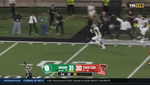 Jeffrey Bassa intercepts Tyler Shough's pass and runs it in to secure Oregon's 38-30 win over Texas Tech