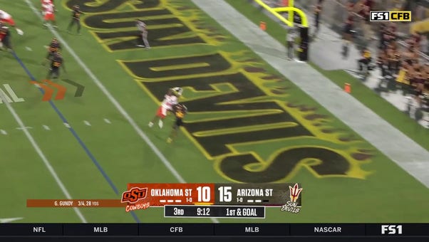 Oklahoma State's Gunnar Gundy finds De'Zhaun Stribling for a three-yard touchdown to grab the lead over Arizona State
