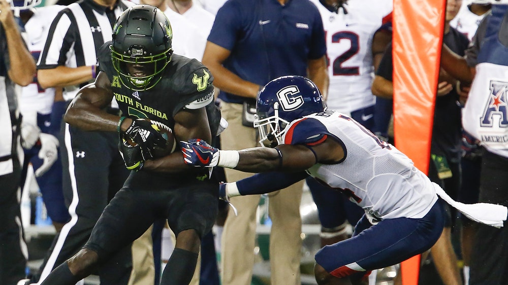 Johnny Ford rushes for 3 TDs as USF overcomes slow start to beat UConn