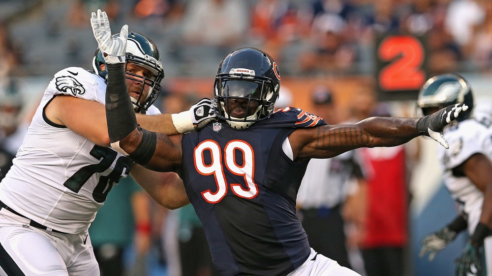 Bears' Lamarr Houston carted off with apparent knee injury