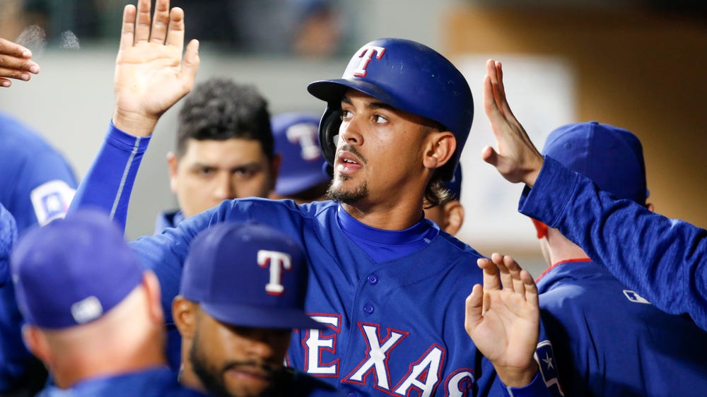 Rangers break through in seventh, beat Mariners 2-0