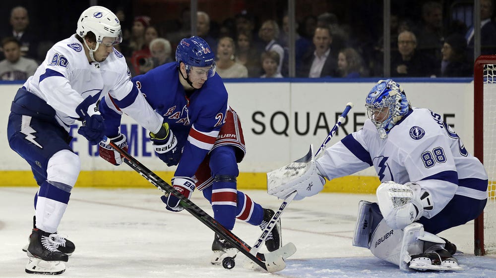 Lightning allow 3 goals late in final period, begin road trip with loss to Rangers