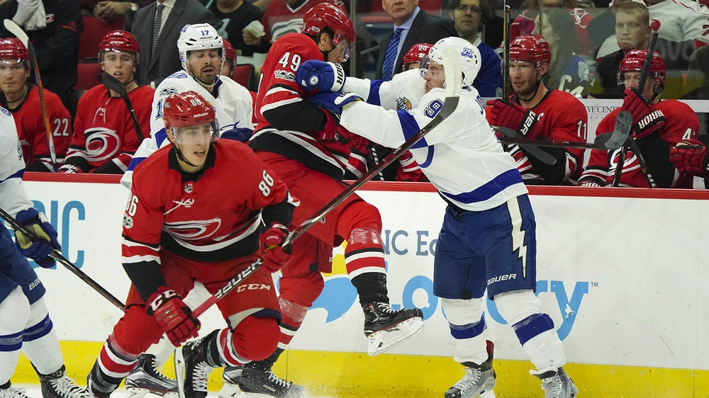 Lightning pile on 3 goals in 3rd to throttle Hurricanes
