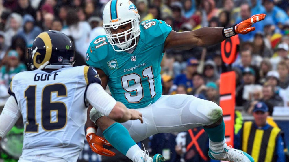 Wake has job secured, hopes to take Dolphins into playoffs for second straight year