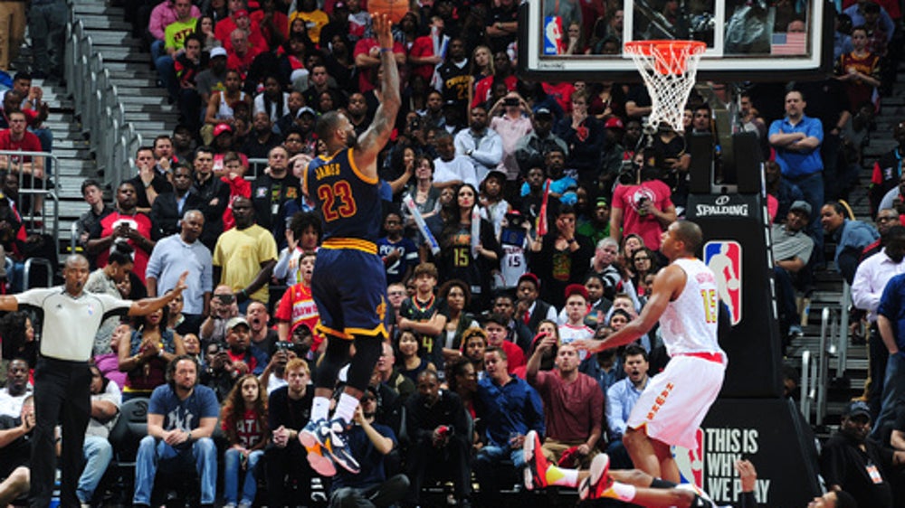 LeBron passes another legend on scoring list, Cavs beat Hawks in OT