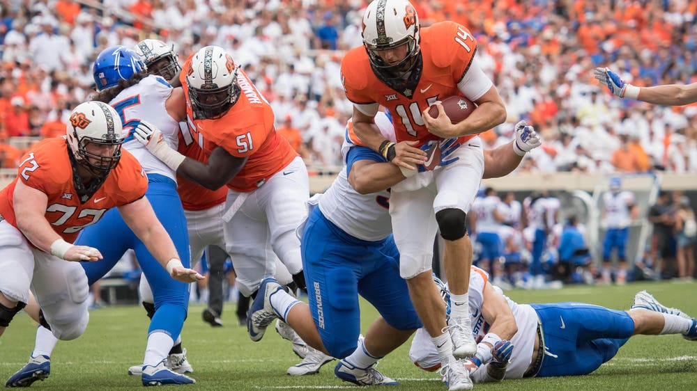 Cornelius leads No. 24 Oklahoma St. past No. 17 Boise St.