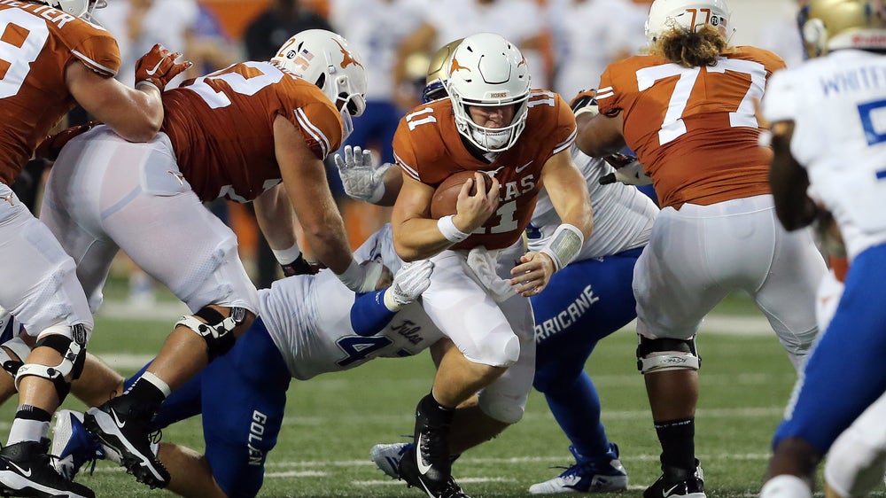 Ehlinger leads Texas to grinding win over Tulsa 28-21