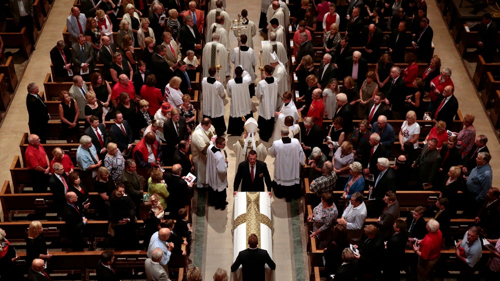 Hundreds gather to say goodbye to Red