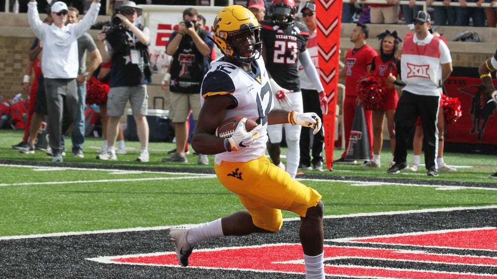 Grier, No. 12 WVU hold on to beat No. 25 Texas Tech, 42-34