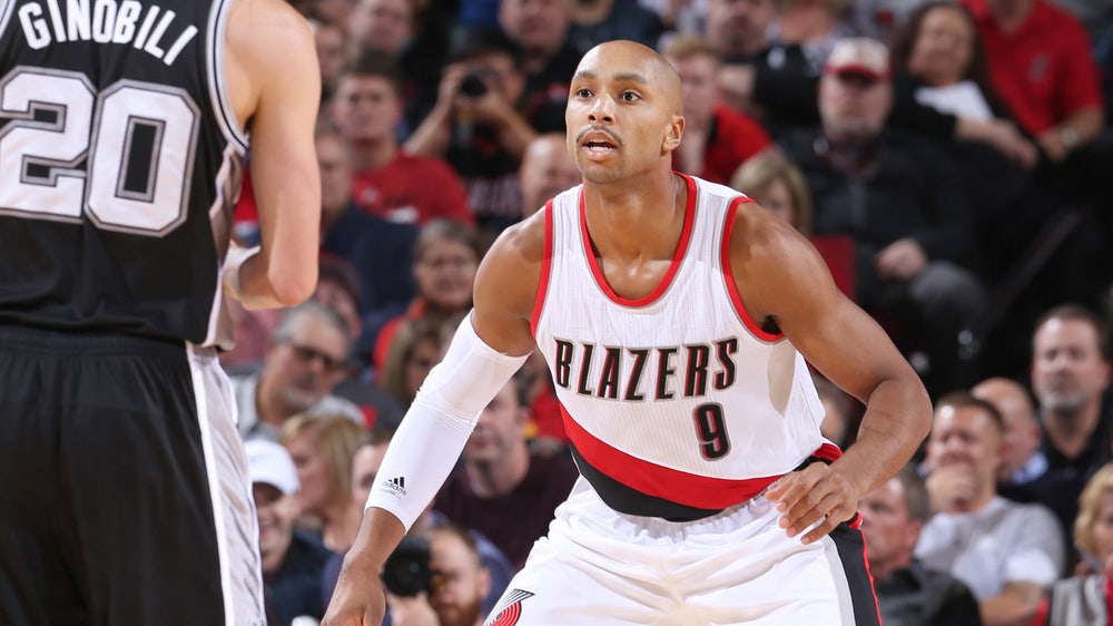 Henderson dips behind the backboard for the dunk of the year