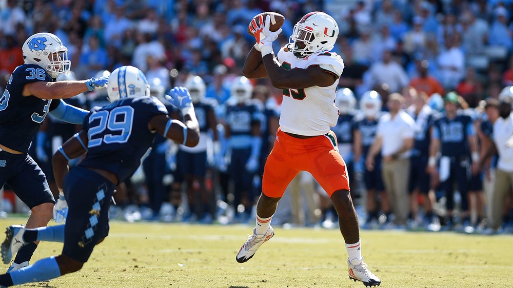 South Florida out, while UCF rises and Miami drops a spot in AP poll shakeup