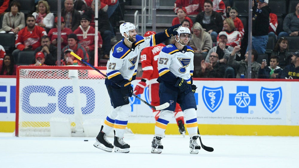 Perron, O'Reilly collect four points each as Blues defeat Red Wings 5-4 in overtime