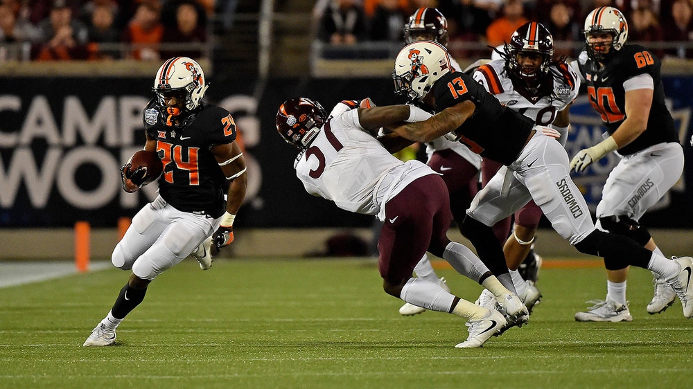 Mason Rudolph, James Washington lead Oklahoma State past West Virginia in Camping World Bowl