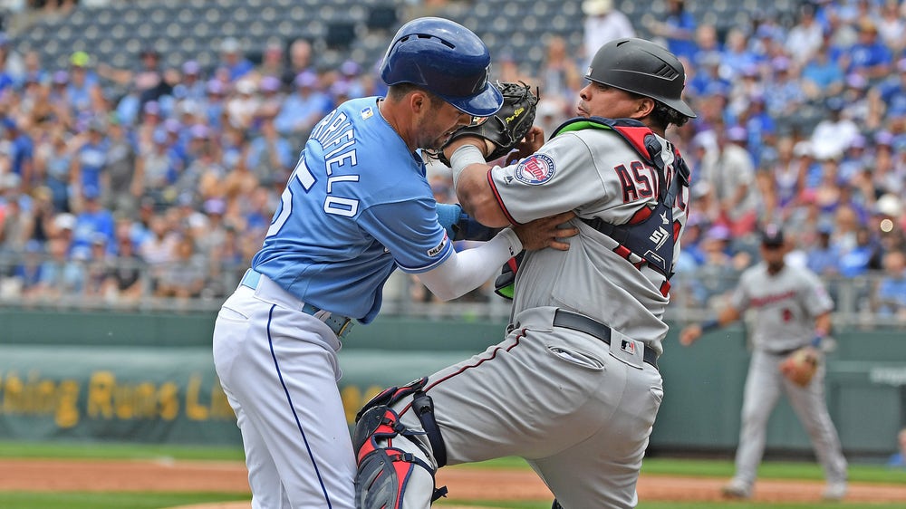 Royals rally with big eighth-inning, but fall 5-3 in extras