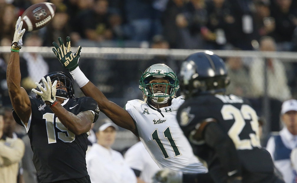 UCF tops USF in thrilling War on I4 to finish a perfect regular season