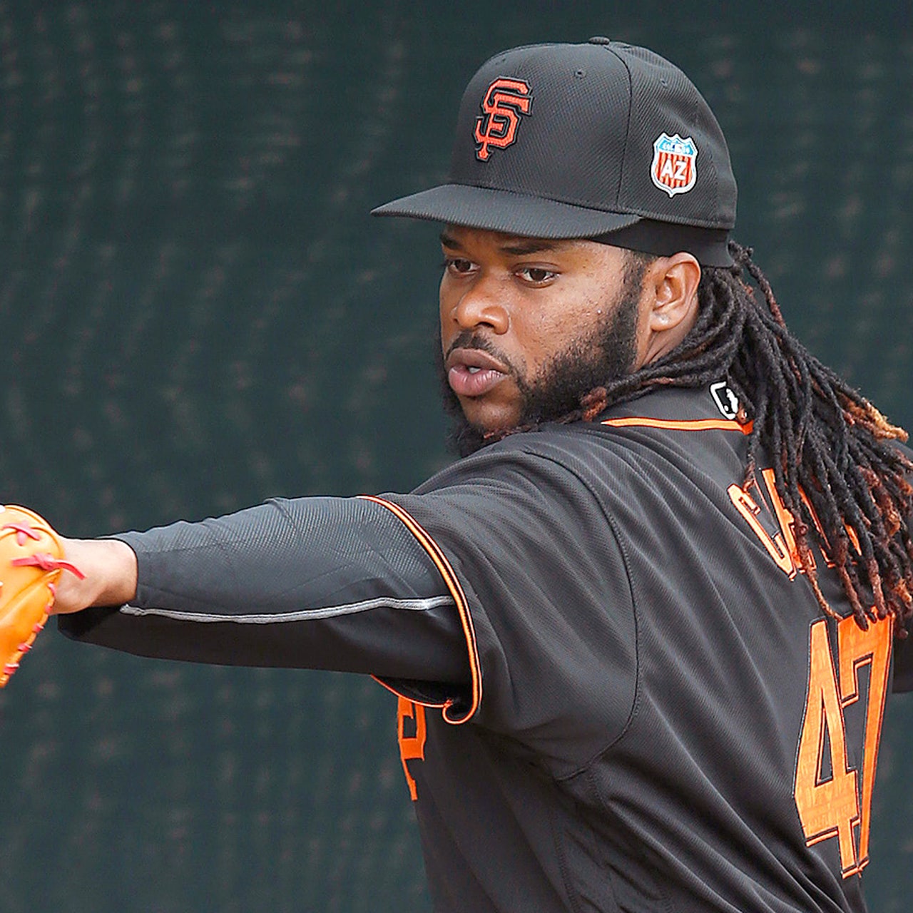 Even Johnny Cueto's hair fits in with 