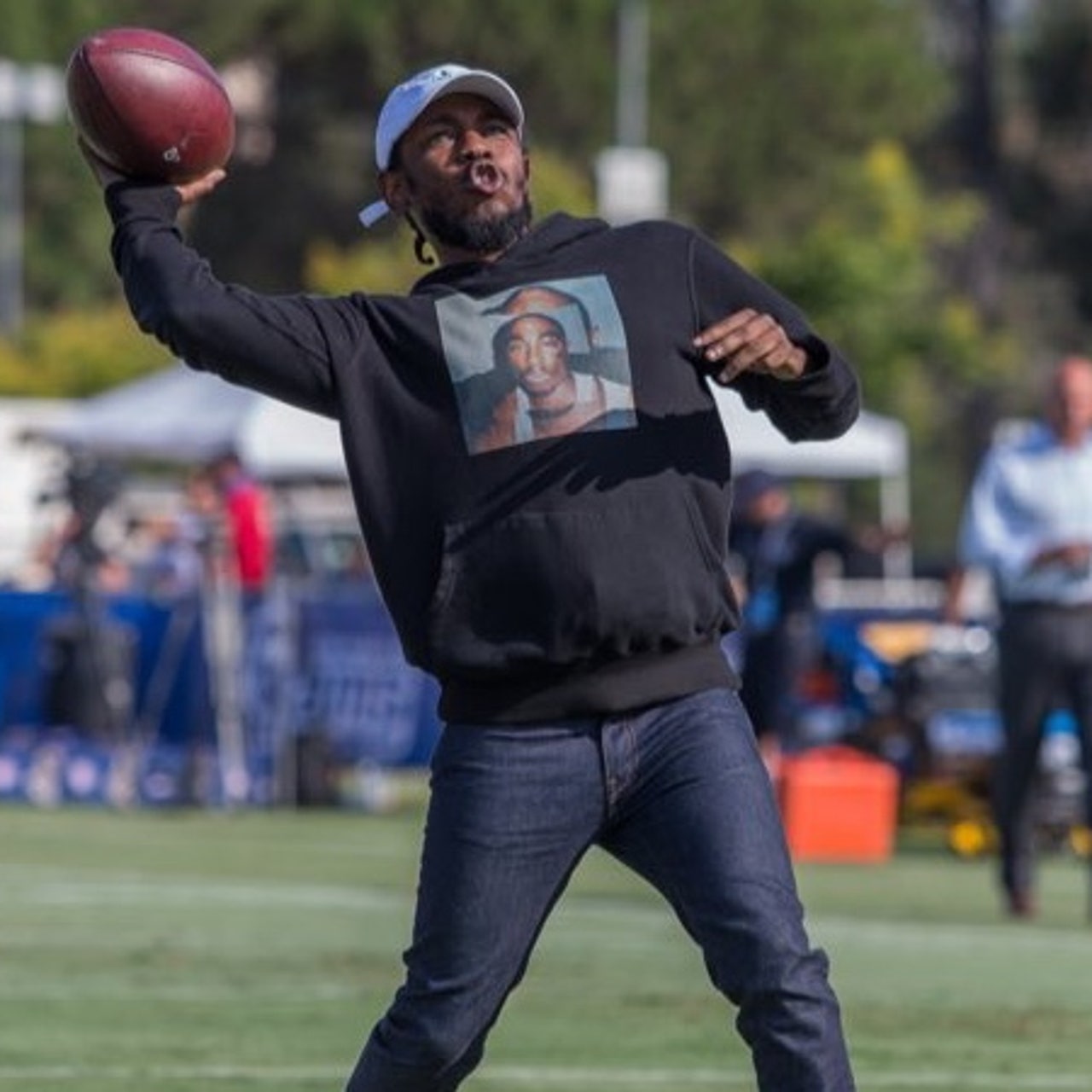 Watch Kendrick Lamar show off his receiving skills at Rams camp