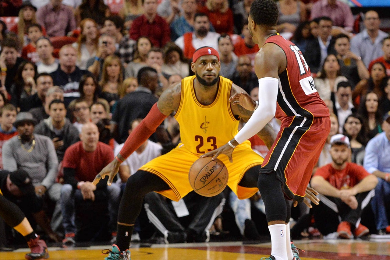 Heat come out on top in LeBron's return 