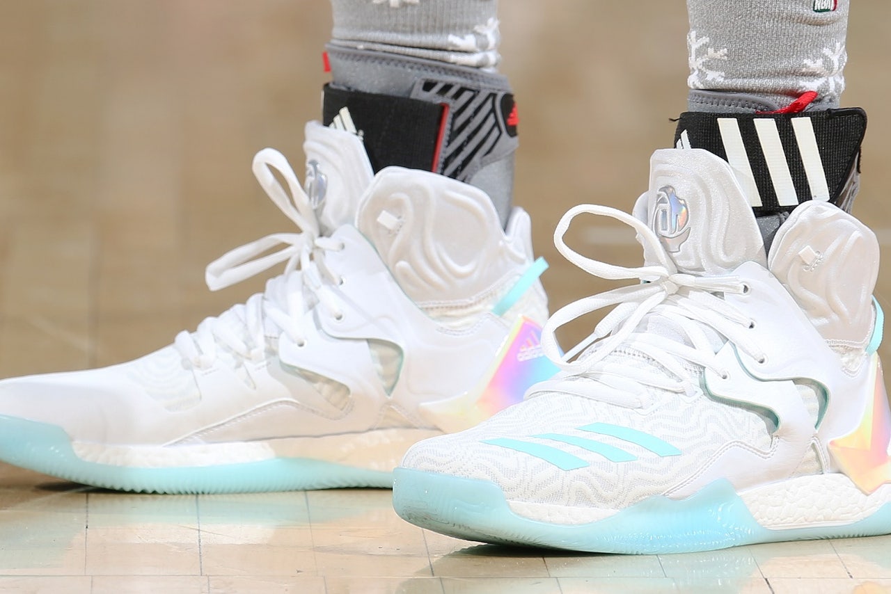 Derrick Rose s ridiculously bright Christmas shoes might be a health risk FOX Sports