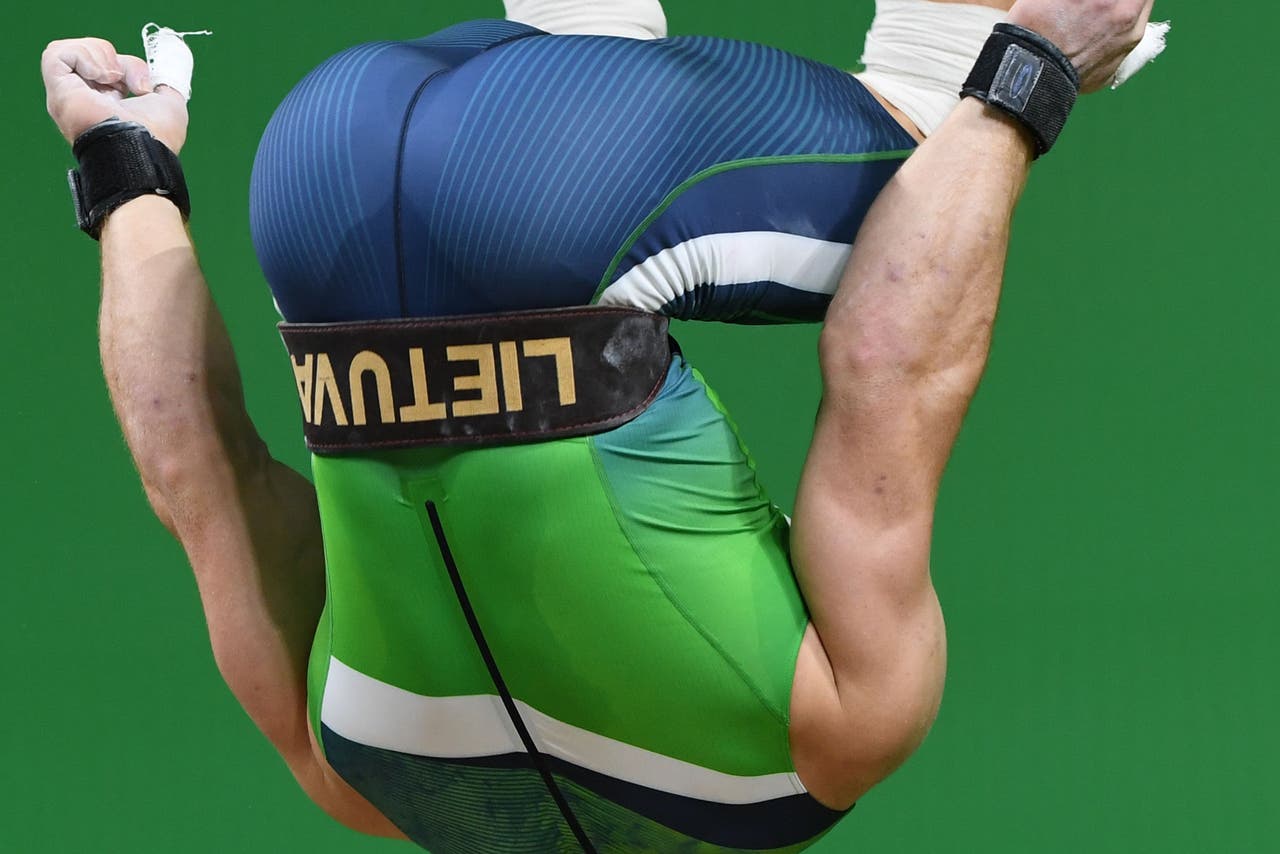 Olympic weightlifter celebrates medal with an incredible backflip FOX