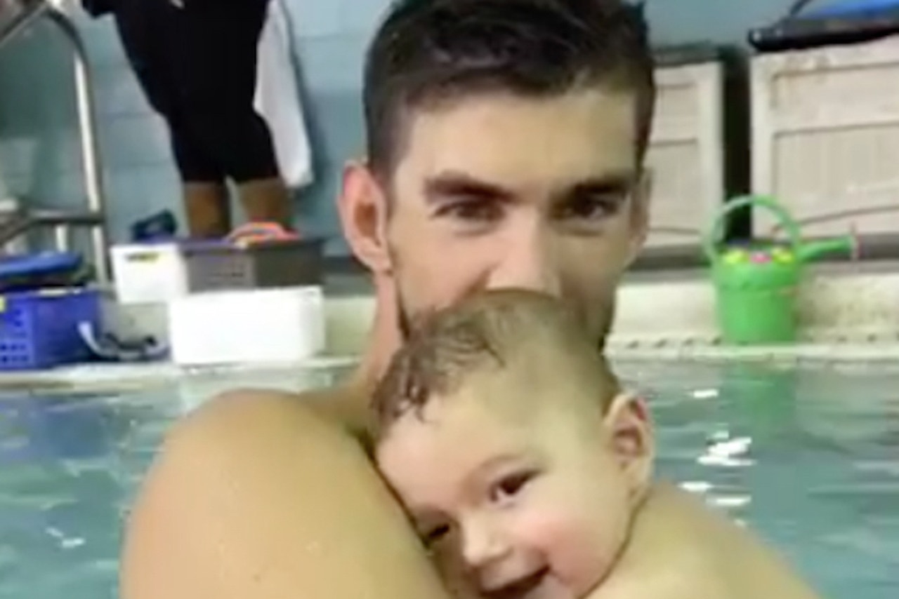Watch Michael Phelps and sixmonthold son Boomer take adorable swim