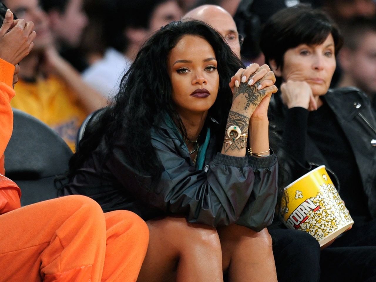 Rihanna LA Lakers Game White Coat - New American Jackets