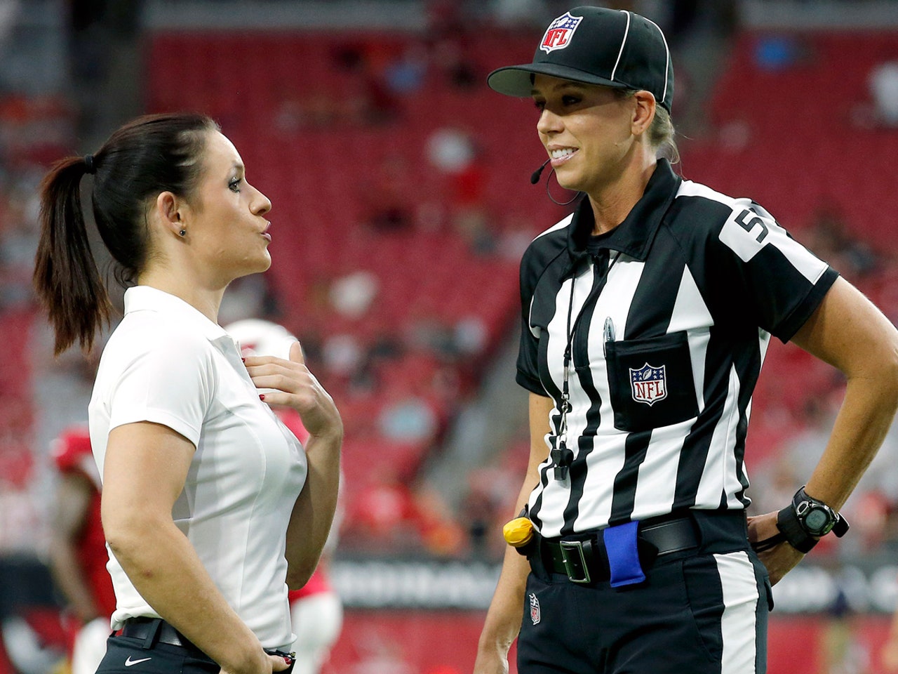 NFL's first woman ref, assistant coach meet before game