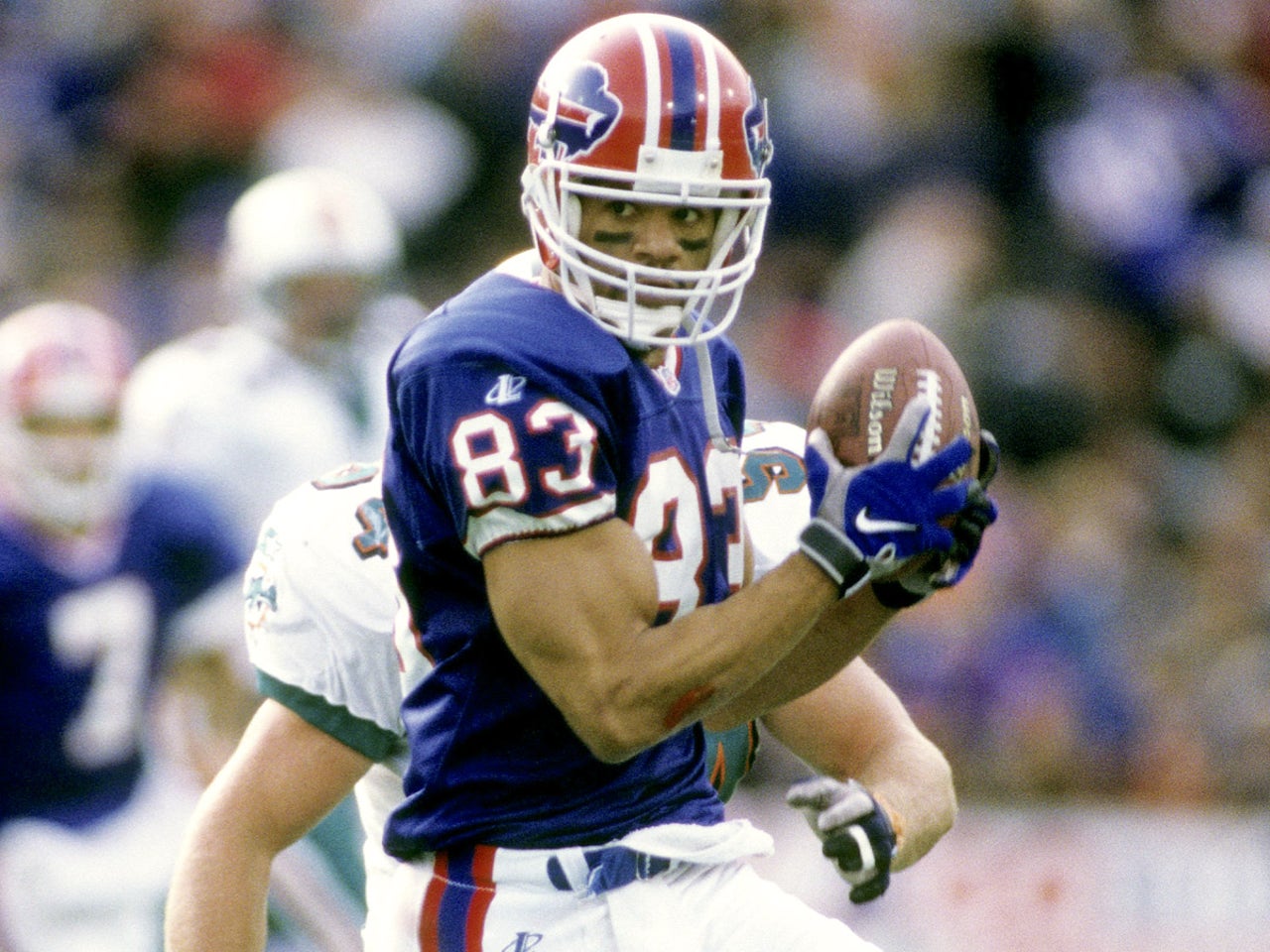 Andre Reed wearing new colors as a KC coach