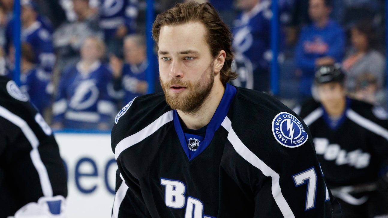 Watch a Lightning defenseman play five finger fillet with trainer before a game