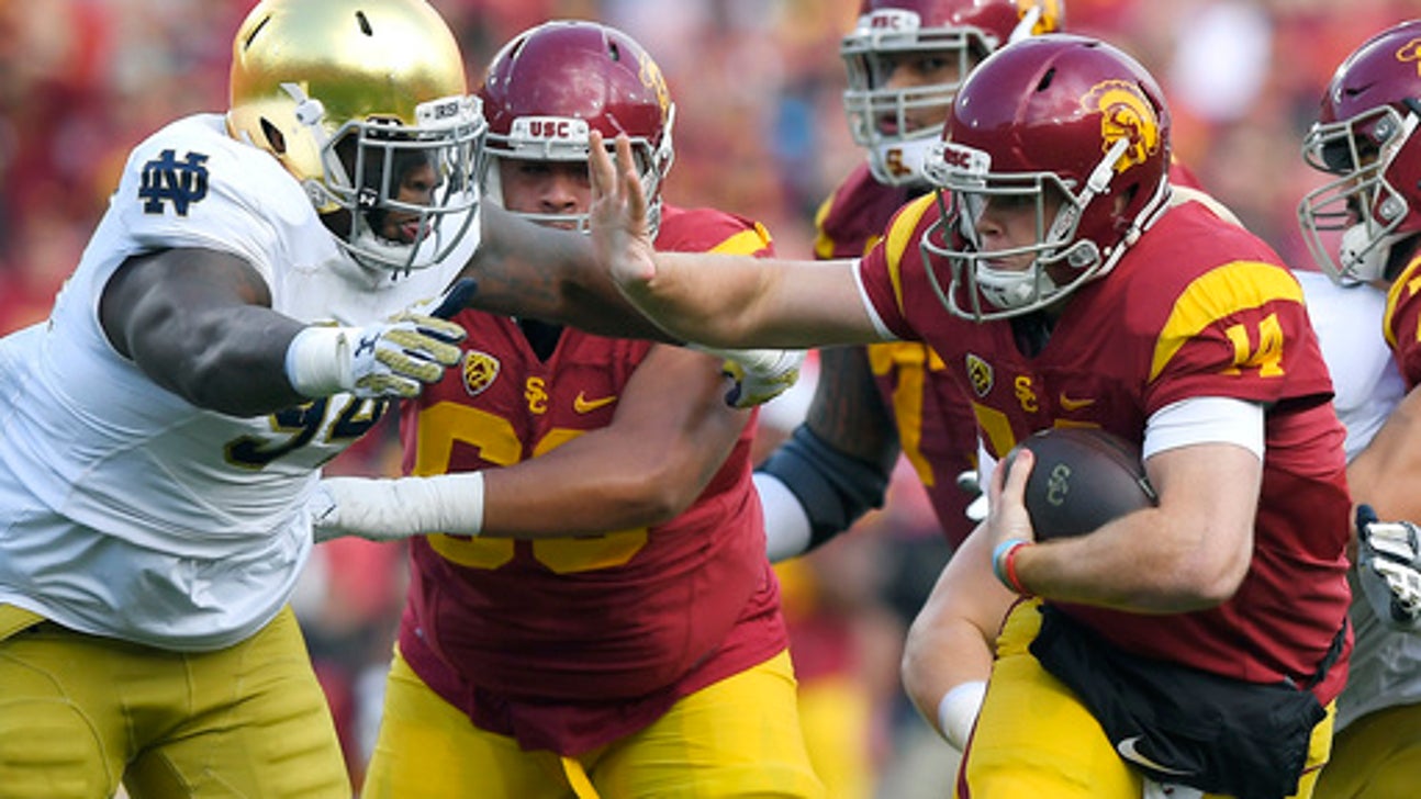 Referee Ron Cherry hurt during Notre Dame-USC game